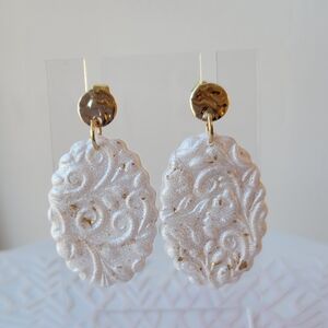 Gold and White Textured Dangle Earrings